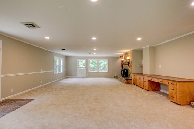 339 Thompson Ln, Clarksville, TN 37040 - unfurnished living room with crown molding, recessed lighting, baseboards, light carpet, and an office area