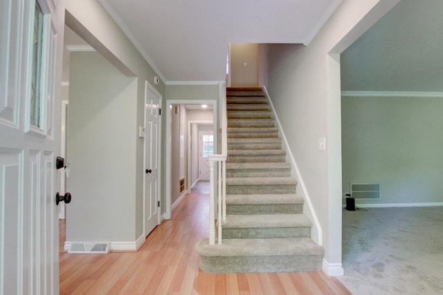339 Thompson Ln, Clarksville, TN 37040 - staircase with wood finished floors, baseboards, and ornamental molding