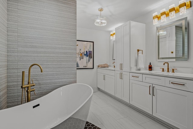 6611 Ellesmere Rd, Nashville, TN 37205 - bathroom with a chandelier, double vanity, a soaking tub, and tile patterned floors