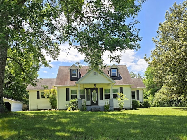 118 Bone Cave Rd, Rock Island, TN 38581 - cape cod house with a front lawn and a porch