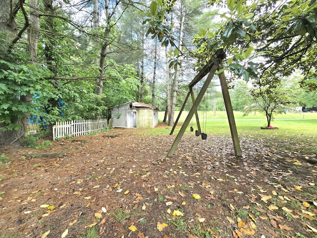 118 Bone Cave Rd, Rock Island, TN 38581 - view of yard with a shed, fence, and an outdoor structure