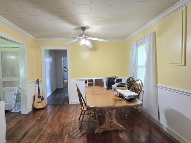 118 Bone Cave Rd, Rock Island, TN 38581 - dining space featuring dark wood-style flooring, a ceiling fan, ornamental molding, and wainscoting