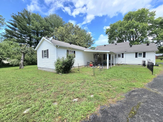 118 Bone Cave Rd, Rock Island, TN 38581 - back of house featuring a yard and a patio