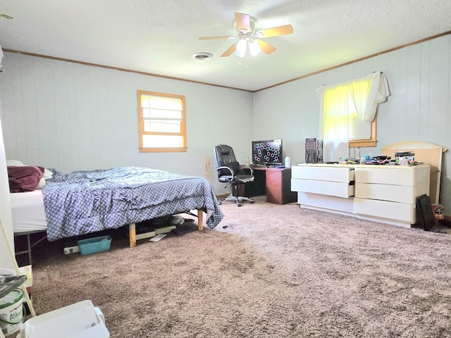 118 Bone Cave Rd, Rock Island, TN 38581 - bedroom featuring ornamental molding, carpet, a desk, ceiling fan, and wood walls