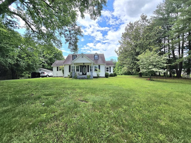 118 Bone Cave Rd, Rock Island, TN 38581 - cape cod house with a front yard and covered porch