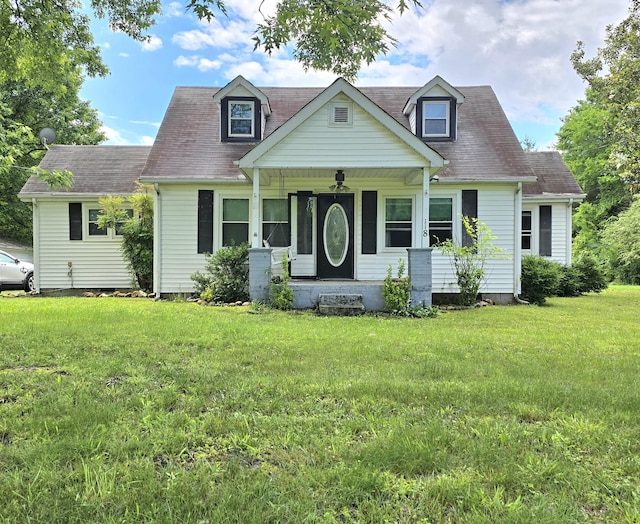 118 Bone Cave Rd, Rock Island, TN 38581 - cape cod house featuring a front lawn, a porch, and roof with shingles