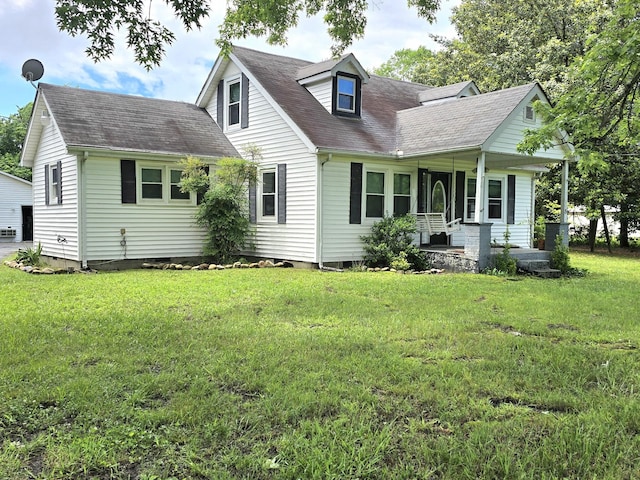 118 Bone Cave Rd, Rock Island, TN 38581 - cape cod home with covered porch, a front lawn, a shingled roof, and crawl space