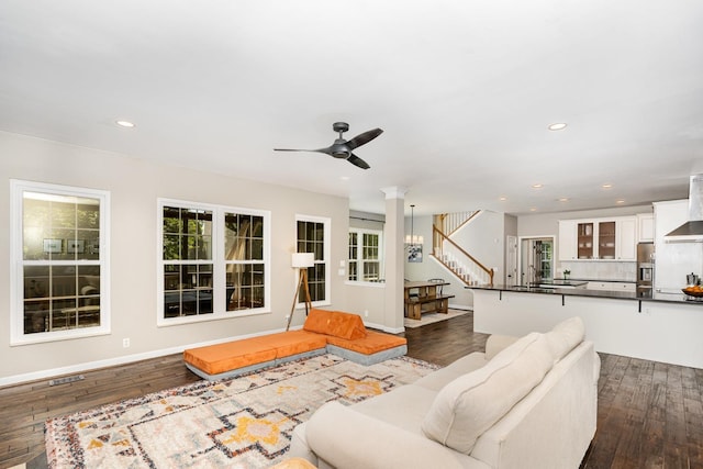 909 Miranda Pl, Franklin, TN 37067 - living area featuring dark wood finished floors, stairs, ceiling fan, recessed lighting, and baseboards