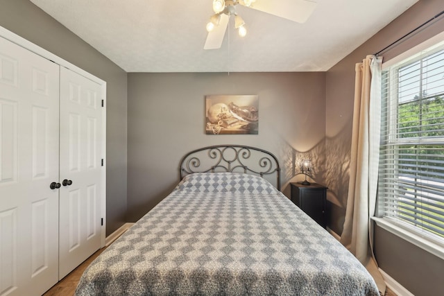 2277 Belotes Ferry Rd, Lebanon, TN 37087 - bedroom featuring multiple windows, baseboards, and ceiling fan