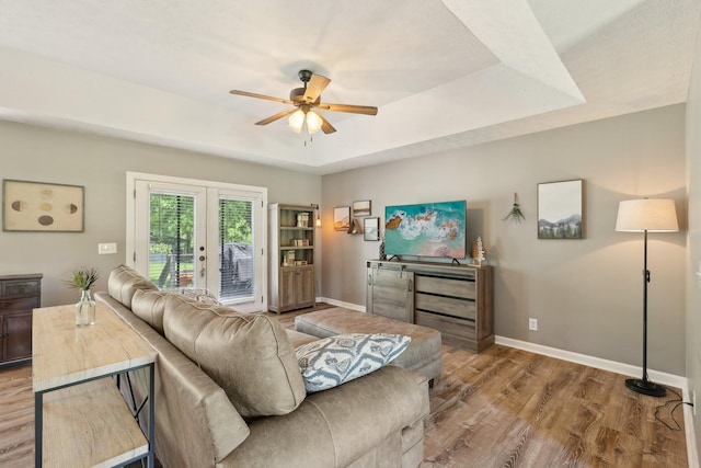 2277 Belotes Ferry Rd, Lebanon, TN 37087 - living room with french doors, a ceiling fan, wood finished floors, and baseboards