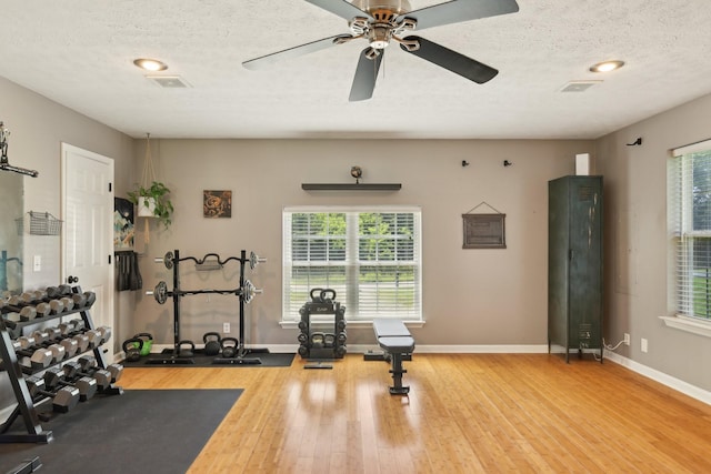 2277 Belotes Ferry Rd, Lebanon, TN 37087 - workout area featuring wood finished floors, a textured ceiling, baseboards, and a ceiling fan