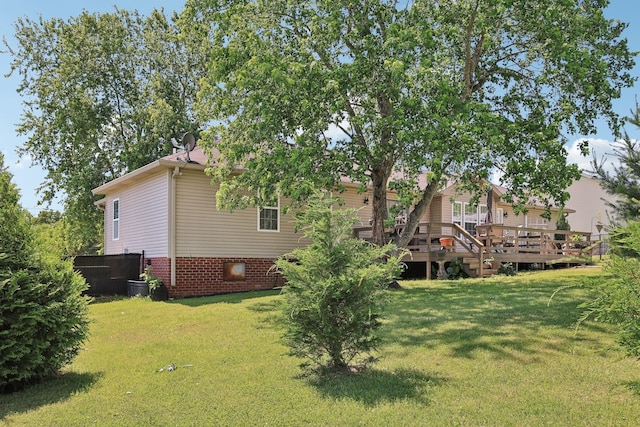 2277 Belotes Ferry Rd, Lebanon, TN 37087 - view of grassy yard featuring a wooden deck