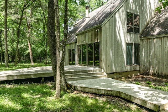 556 Lakeshore Dr, Old Hickory, TN 37138 - view of side of home with a deck, a shingled roof, and crawl space