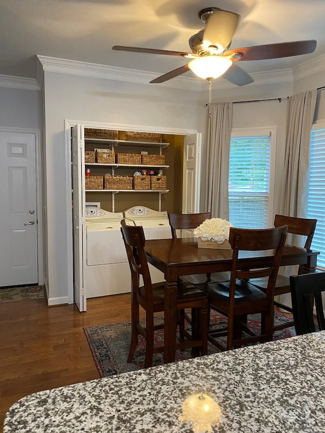415 Ashley Ln, Kingston Springs, TN 37082 - dining room featuring crown molding, washing machine and dryer, ceiling fan, and dark wood finished floors