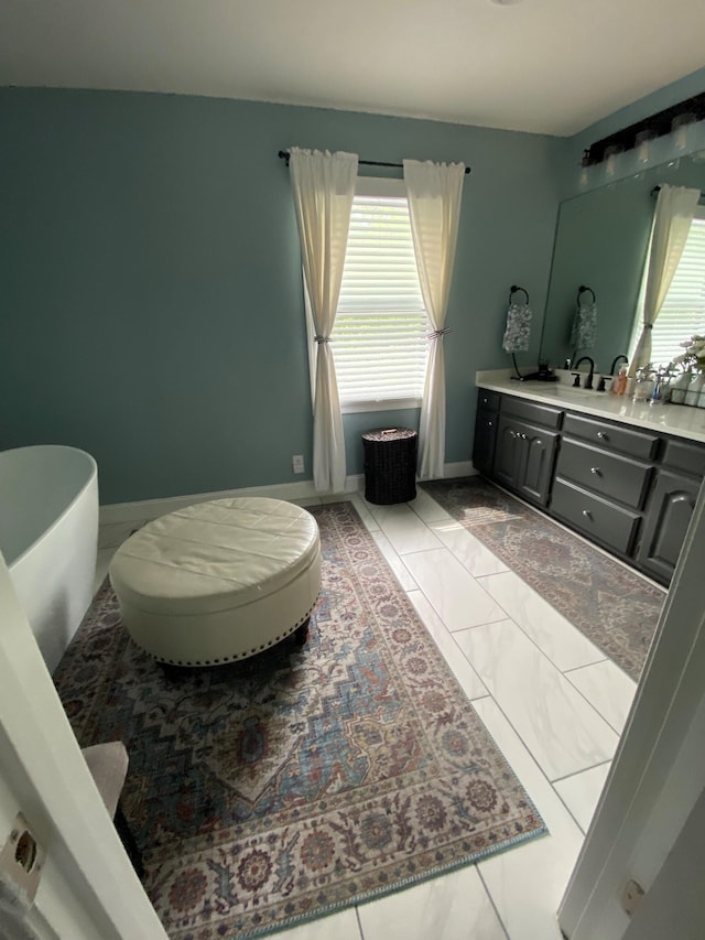 415 Ashley Ln, Kingston Springs, TN 37082 - bathroom featuring double vanity and baseboards