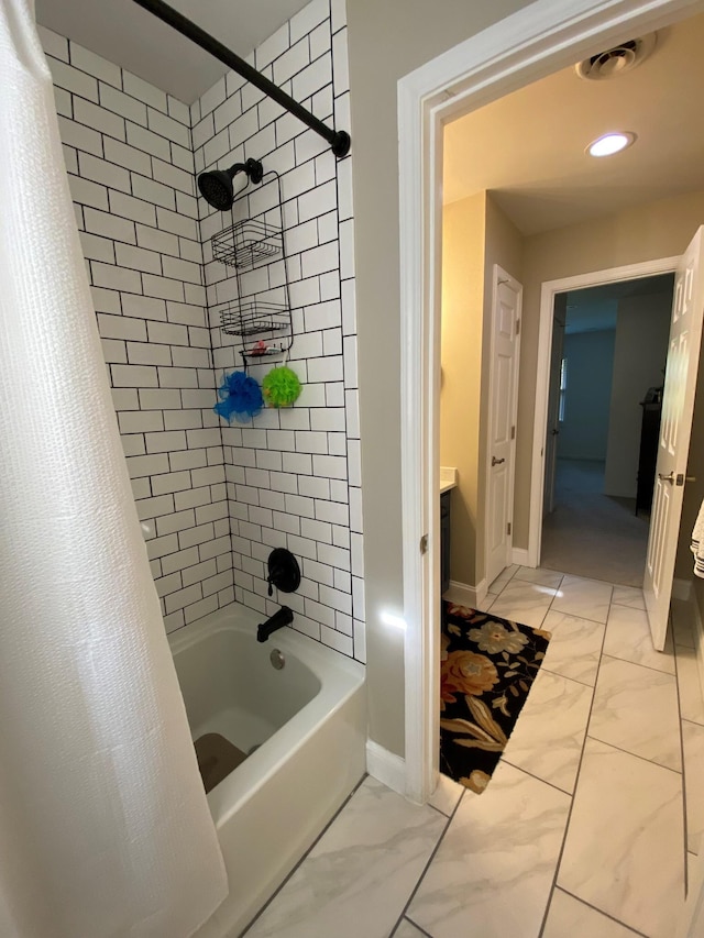 415 Ashley Ln, Kingston Springs, TN 37082 - full bath with shower / tub combo, marble look tiles, recessed lighting, and vanity