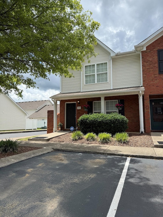 1011 Wolves Den Pl, Murfreesboro, TN 37128 - view of front of property with brick siding and uncovered parking