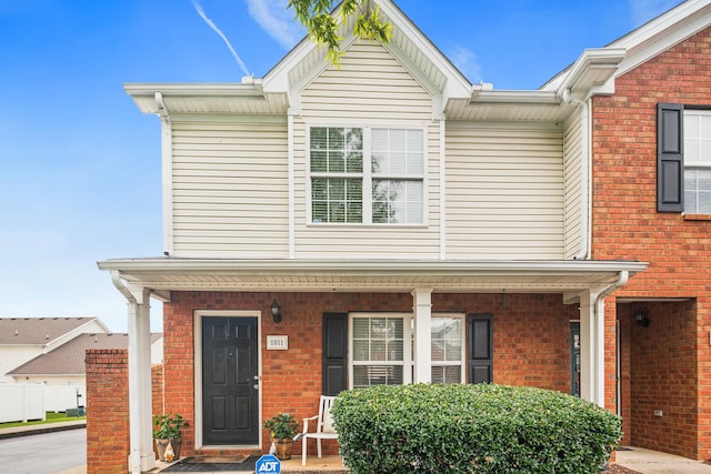 1011 Wolves Den Pl, Murfreesboro, TN 37128 - traditional-style house with covered porch and brick siding