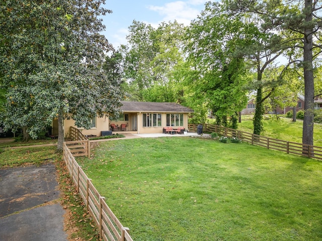 209 Woods Dr, Columbia, TN 38401 - rear view of property featuring a patio area and stucco siding