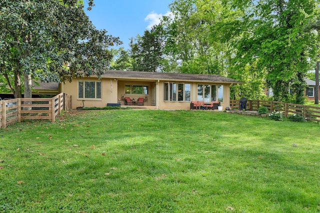 209 Woods Dr, Columbia, TN 38401 - back of house with stucco siding
