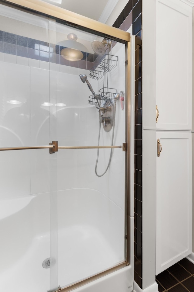 209 Woods Dr, Columbia, TN 38401 - bathroom with a stall shower and tile patterned flooring