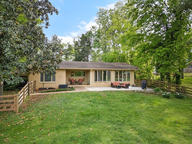 209 Woods Dr, Columbia, TN 38401 - back of house featuring a patio area, stucco siding, and central AC unit