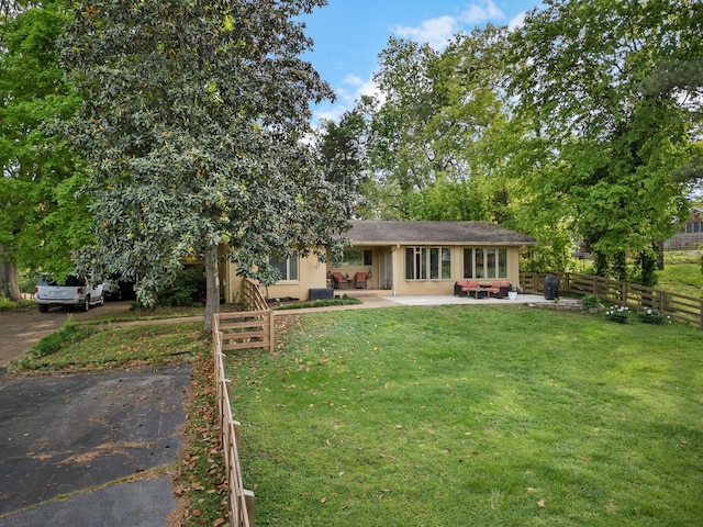 209 Woods Dr, Columbia, TN 38401 - view of front of property with a patio area and stucco siding