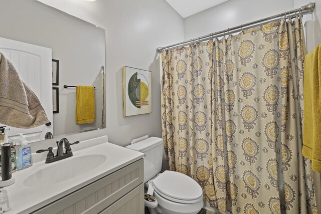 103 Lockhart St, Dickson, TN 37055 - bathroom with vanity, toilet, and curtained shower
