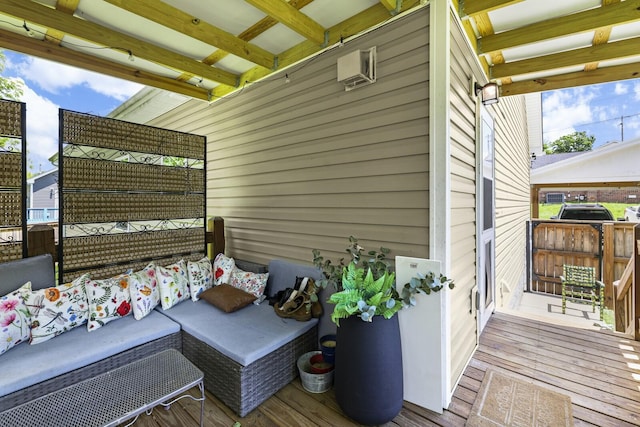 103 Lockhart St, Dickson, TN 37055 - wooden deck with an outdoor hangout area and an AC wall unit