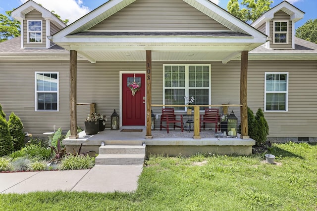 103 Lockhart St, Dickson, TN 37055 - view of front of home featuring a porch, a front yard, and roof with shingles