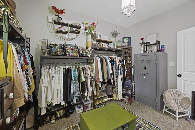 103 Lockhart St, Dickson, TN 37055 - spacious closet with carpet flooring and a chandelier