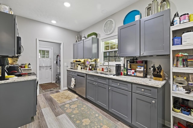 103 Lockhart St, Dickson, TN 37055 - kitchen featuring stainless steel appliances, a sink, gray cabinets, wood finished floors, and recessed lighting