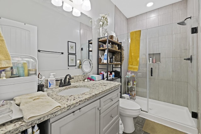 103 Lockhart St, Dickson, TN 37055 - full bathroom with a shower stall, vanity, toilet, and recessed lighting