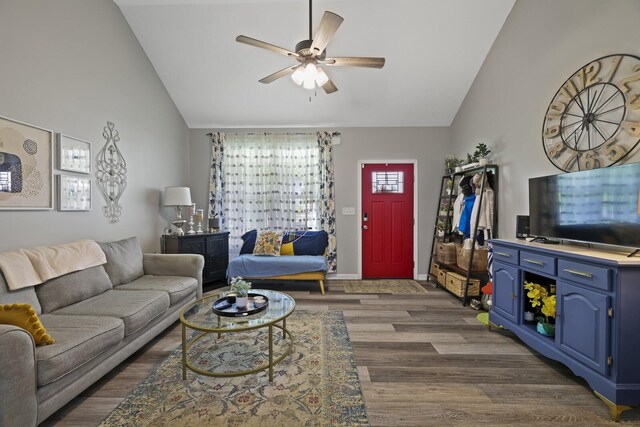 103 Lockhart St, Dickson, TN 37055 - living room featuring lofted ceiling, dark wood-style floors, ceiling fan, and baseboards