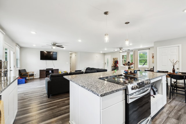 176 Morningside Dr, La Vergne, TN 37086 - kitchen featuring electric stove, ceiling fan, recessed lighting, dark wood-style flooring, and white cabinetry