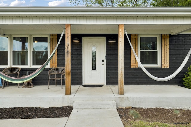 176 Morningside Dr, La Vergne, TN 37086 - property entrance with brick siding and a porch