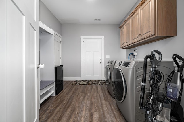 1130 Ferrells Loop Rd, Beechgrove, TN 37018 - washroom featuring cabinet space, dark wood finished floors, separate washer and dryer, and baseboards
