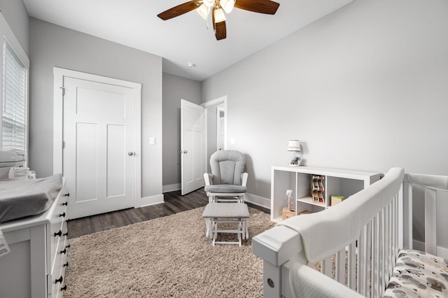 1130 Ferrells Loop Rd, Beechgrove, TN 37018 - bedroom featuring wood finished floors, a nursery area, baseboards, and a ceiling fan