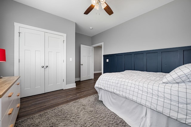 1130 Ferrells Loop Rd, Beechgrove, TN 37018 - bedroom featuring dark wood-type flooring, a closet, ceiling fan, and wainscoting