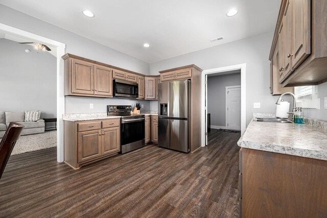 1130 Ferrells Loop Rd, Beechgrove, TN 37018 - kitchen with stainless steel appliances, a sink, dark wood-style flooring, light countertops, and recessed lighting