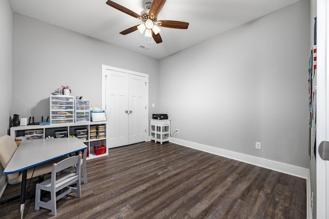 1130 Ferrells Loop Rd, Beechgrove, TN 37018 - home office with dark wood-style floors, ceiling fan, and baseboards