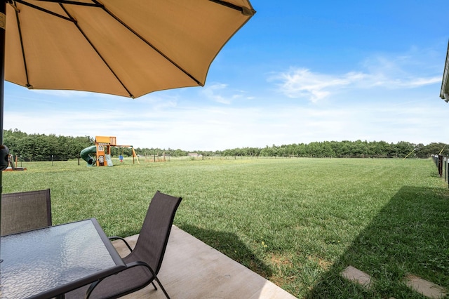 1130 Ferrells Loop Rd, Beechgrove, TN 37018 - view of green lawn with a playground