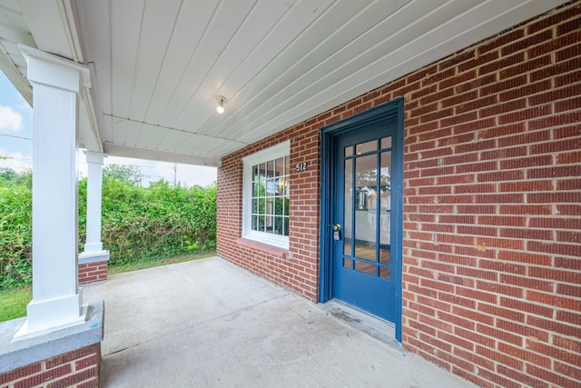 512 Transit Ave, Columbia, TN 38401 - view of exterior entry with brick siding and covered porch