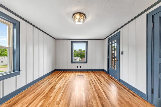 512 Transit Ave, Columbia, TN 38401 - empty room featuring a decorative wall, light wood-type flooring, and baseboards