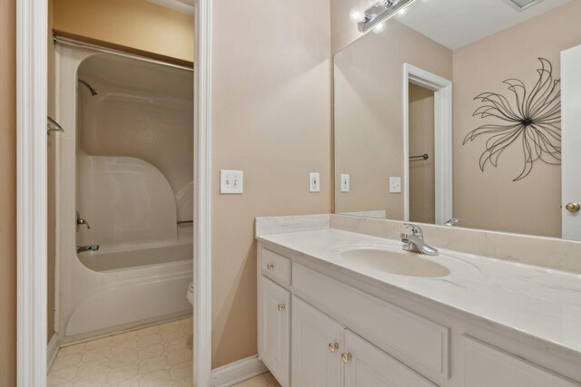 2305 Black Fox Ct, Murfreesboro, TN 37127 - bathroom with vanity, shower / washtub combination, toilet, tile patterned floors, and baseboards