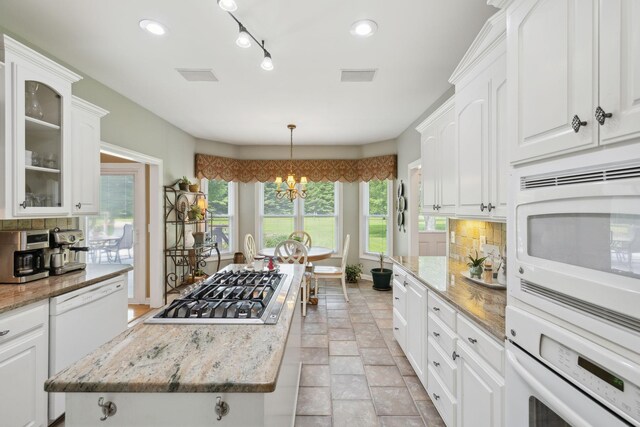 2305 Black Fox Ct, Murfreesboro, TN 37127 - kitchen featuring white appliances, a chandelier, tasteful backsplash, white cabinetry, and recessed lighting