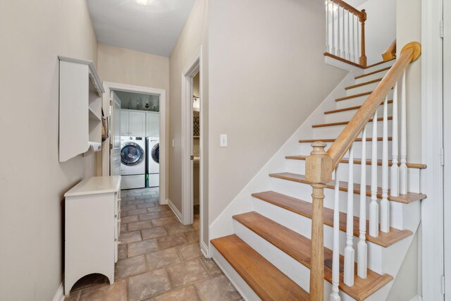 2305 Black Fox Ct, Murfreesboro, TN 37127 - staircase featuring washing machine and dryer, stone finish floors, and baseboards