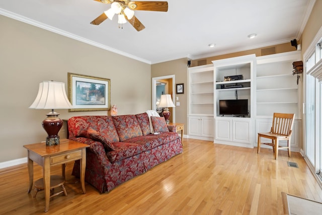 2305 Black Fox Ct, Murfreesboro, TN 37127 - living area featuring light wood-style floors, ceiling fan, ornamental molding, and baseboards