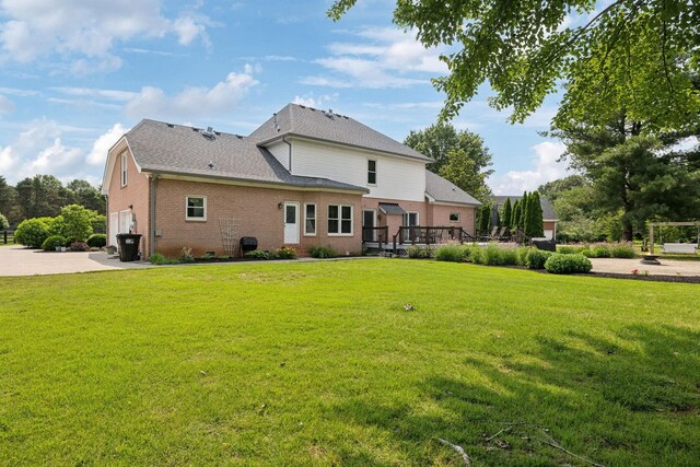 2305 Black Fox Ct, Murfreesboro, TN 37127 - back of property with a garage, a yard, and brick siding