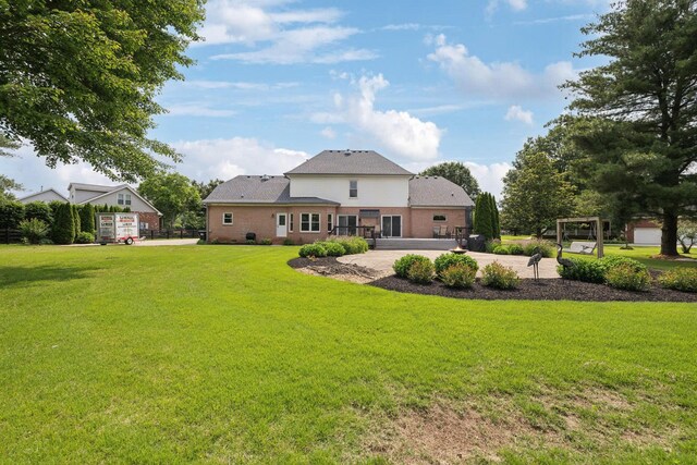 2305 Black Fox Ct, Murfreesboro, TN 37127 - back of house with a lawn and brick siding